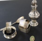 2 pairs of silver engraved napkin rings, 1 spoon, 1 pepper pot and Clover Dairies 30yr badge.