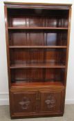 Oriental inspired book case with small cabinet