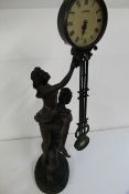 Bronze effect statue with clock, untested