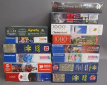 14 jigsaws - 8 Sealed jigsaws and 6 completed