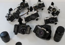 Selection of Yashica cameras to include, FX-D, J5, 2 x FX-2, FX-1 with 135 lens, TL Electro, FX3