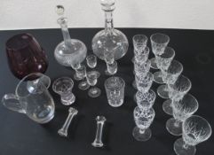 Mixed selection of glassware, including decanters glasses, water jug, purple vase etc.