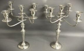 Pair of silver plate candelabra each with 4 twisted branches