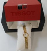 Tissot stainless steel ladies watch with mother of pearl style dial, ref no T058009A in presentation