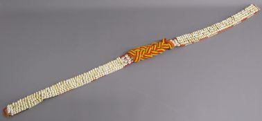 African shell belt with beaded knot design centre - 114cm