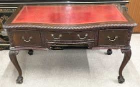 Georgian style mahogany desk on cabriole legs with ball & claw feet & a leather skiver top L130cm