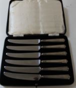 Set of silver handled fruit knives