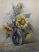 Oil on canvas of sun flowers in a vase, signed O Rocca. 77cm x 98cm