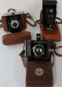 3 roll film cameras, Ikonta Compur + access, Zeiss Ikon Nettar II, No 2 folding Autographic Brownie