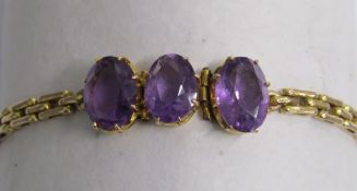 3 stone amethyst bracelet set in tested as 15ct gold - total weight 11.9g