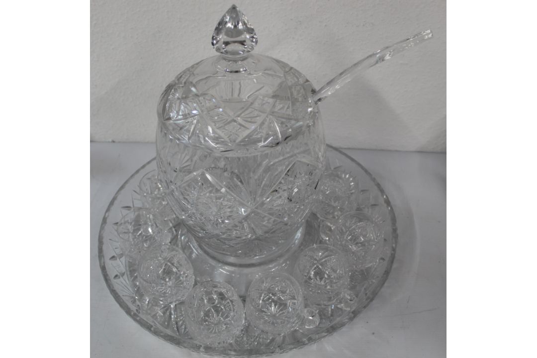 Cut glass punch bowl with ladle and eleven single handled matching glasses on cut glass tray. - Image 1 of 2