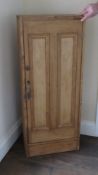 A pine single door cabinet, shelves and back deficient, 46 x 24 x 112cm.