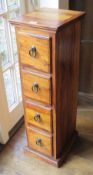 A teak four drawer Wellington type chest, 27 x 32 x 90cm.