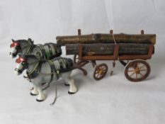 A ceramic horse and wooden cart figurine, Melba ware.