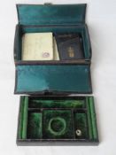 A delightful vintage leather travelling jewellery box, opening to reveal a quantity of letters,