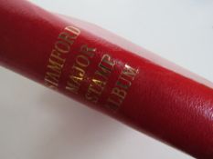 Stamps; a Stamford album containing various 20th century stamps, Ceylon, Cayman Islands,