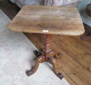 A square top oak side table raised over quatreform base, 62 x 57 x 66cm.