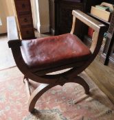 A stout oak leather top calimnos stool, 63cm wide.