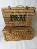 A Fortnum & Mason wicker picknic hamper together with another similar marked F&M. Two items.