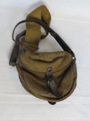 A canvas and leather cartridge bag.
