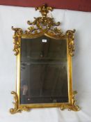 An attractive Venetian type 20th century wall mirror with gilded frame,