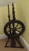 A vintage bobbin turned spinning wheel, 90cm high.