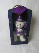 A Millennium Keepsake bear in 'suitcase'.