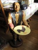 A contemporary wood effect 'butler' standing 3ft high.