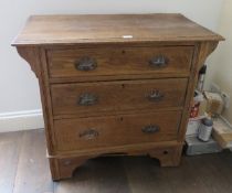 An Edwardian oak chest of three drawers, 3ft wide.