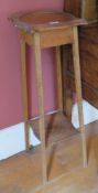 An Edwardian oak planter stand, 90cm high.
