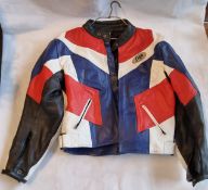 A leather motorcycle jacket by Figo in red white and blue, size 46 chest.