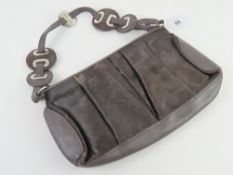 A brown cow hide and leather handbag by Fiorelli, approx 32cm wide.