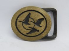 A rare Tech-Ether Guild brass belt buckle 'Migration'.