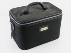 A Pierre Cardin travelling case approx 31cm wide.