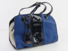 A blue and grey leather handbag by Clarks approx 31cm wide.