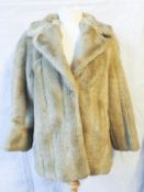 A vintage faux fur coat.