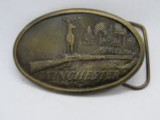 A Winchester gun belt buckle by Indiana Metal Crafts.