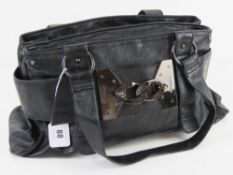 A black leather handbag by Fiorelli approx 40cm wide.