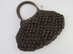 A Hobbs crochet type handbag in brown approx 34cm wide.