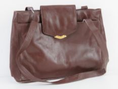 A vintage Jane Shilton handbag in brown, approx 34cm wide.