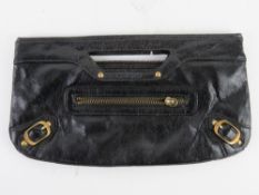 A black leather clutch bag approx 30cm wide.