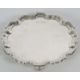 A sterling silver card salver of plain form, having pie crust edge and supported on three cast - Image 1 of 3
