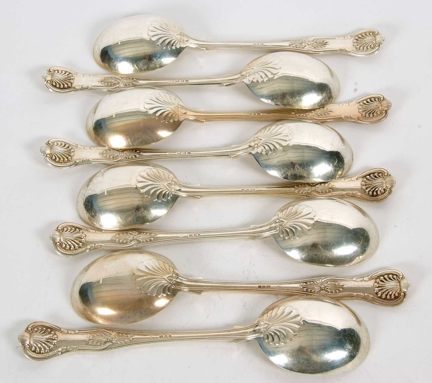 Eight silver Kings pattern soup spoons, double struck, five hallmarked for London 1933, makers - Image 2 of 3
