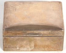 George VI silver cigarette box of rectangular form, engine turned decorated lid around an Art Deco