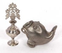 A silver plated anointing bottle together with a metal fish ornament possibly Just Anderson unmarked