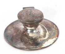 A George V silver capstan ink well of typical form, loaded, (a/f), 11.5cm diameter, Birmingham 1912,