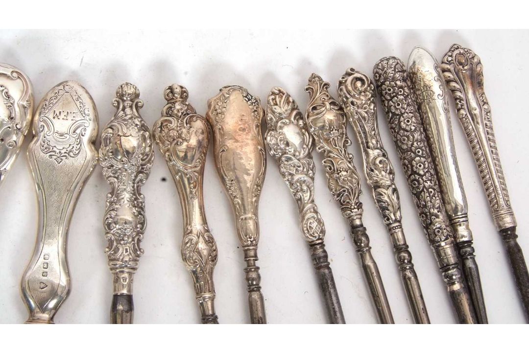 A group of twenty two late 19th/early 20th Century silver and steel button hooks, various dates/ - Image 4 of 4