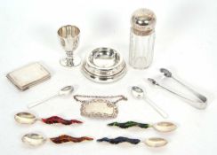 Mixed Lot: A hallmarked silver egg cup, Birmingham 1934, a silver sherry spirit lable, Birmingham