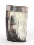 A horn beaker with a hallmarked silver rim, London 2006, makers mark P.C.C, 11cm tall