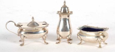A matching silver pepper and hinged lid mustard and liner, Birmingham 1965, makers mark for Barker